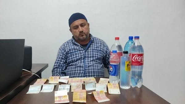 В Хатлоне задержан «целитель» за торговлю «волшебной водой»