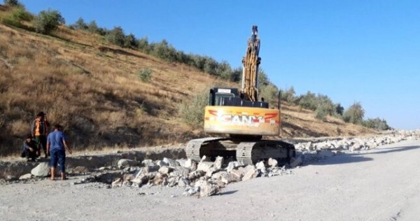 В Рогуне началось строительство республиканской дороги у въезда в город
